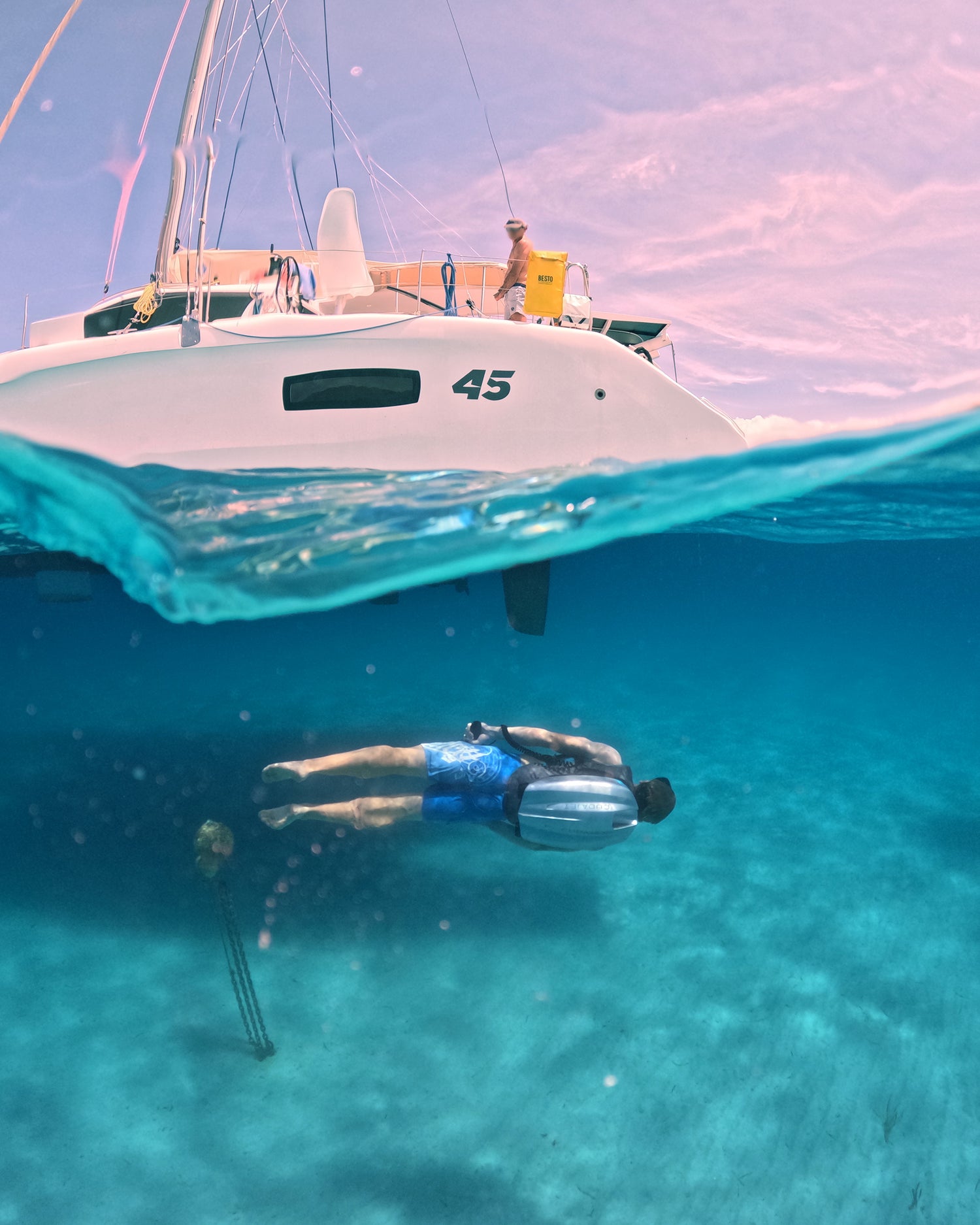 Superyacht toy Underwater Jetpack below sailing yacht in the Mediterranean