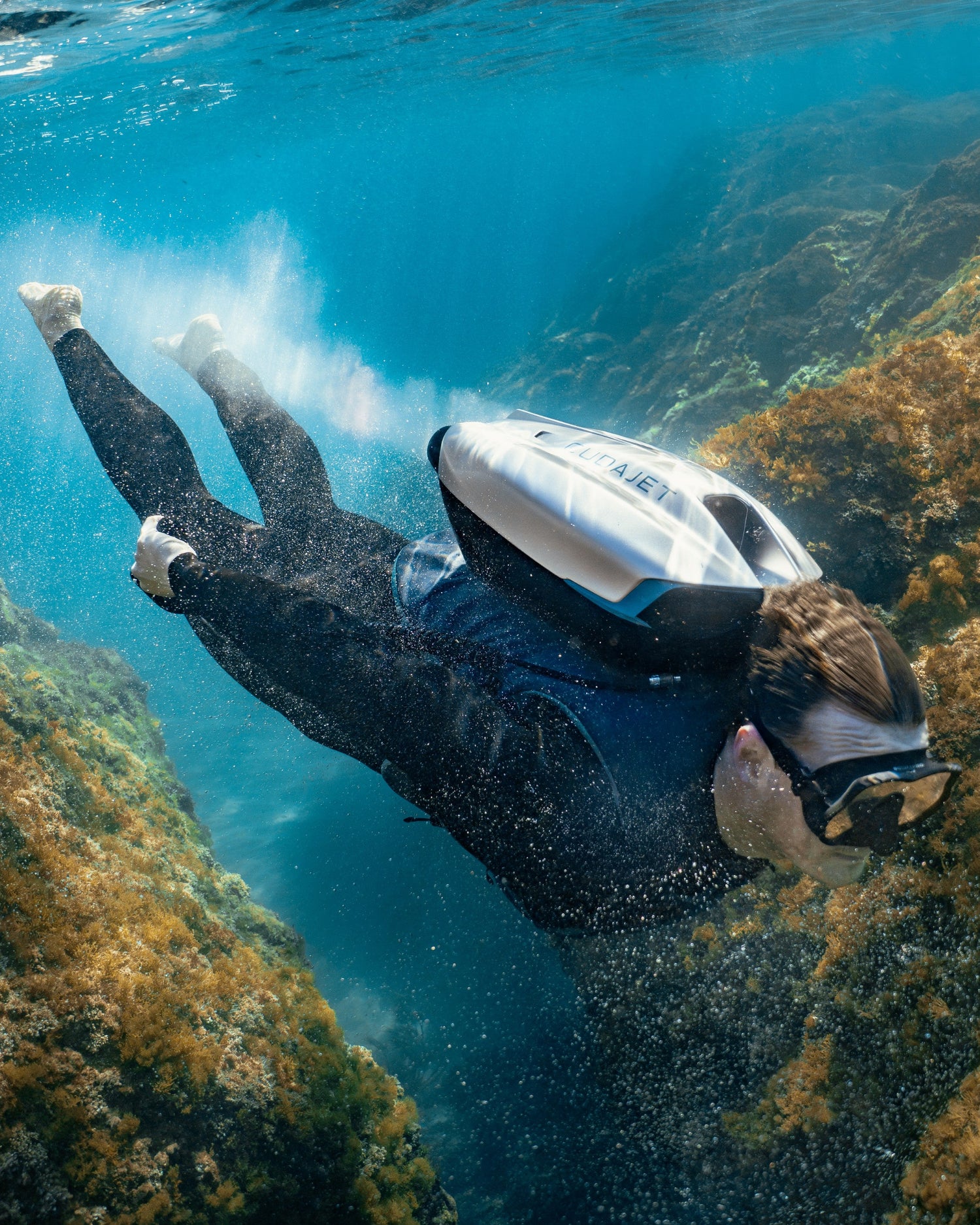 Underwater Jetpacking flying over rocks in Spain